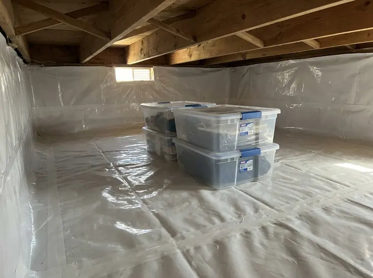 Under-house storage area protected with vapor barrier